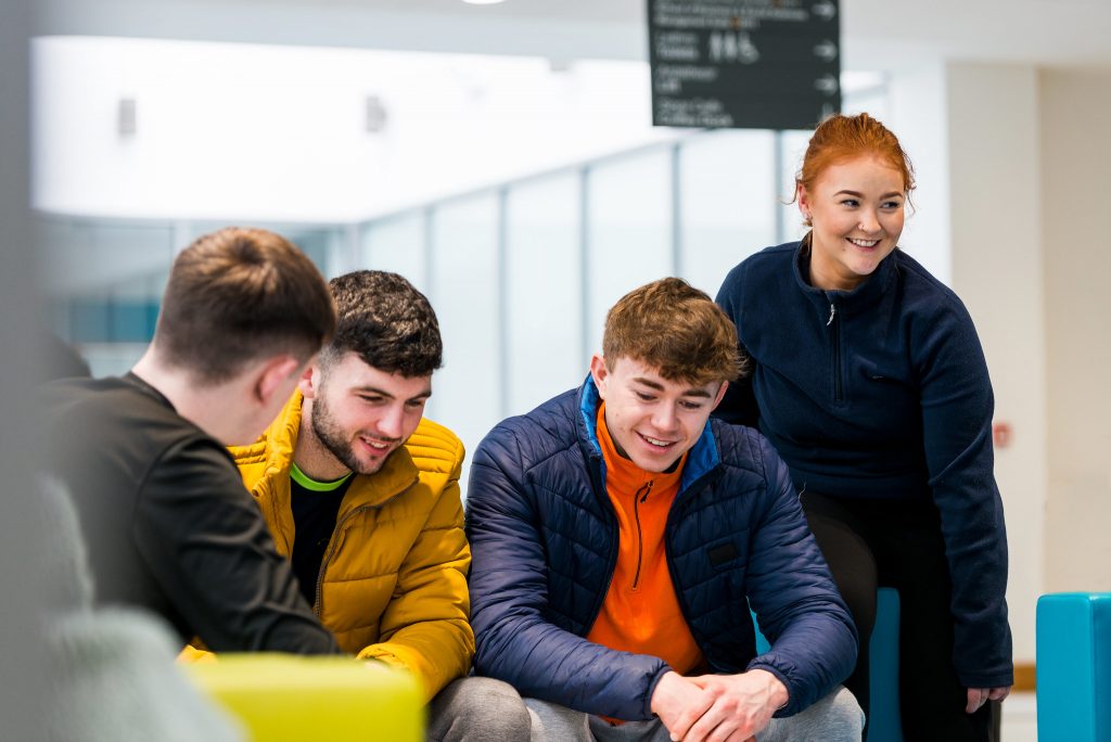 Students discussing international tuition fees