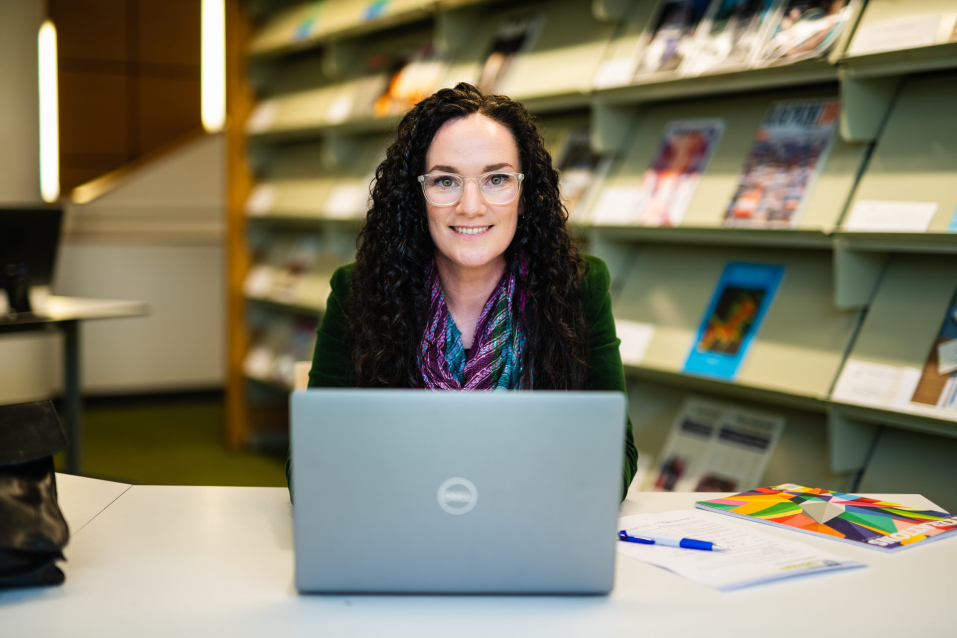 A lecturer working on her laptop