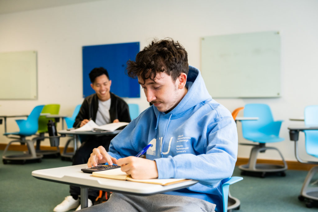 A student in a lecture room